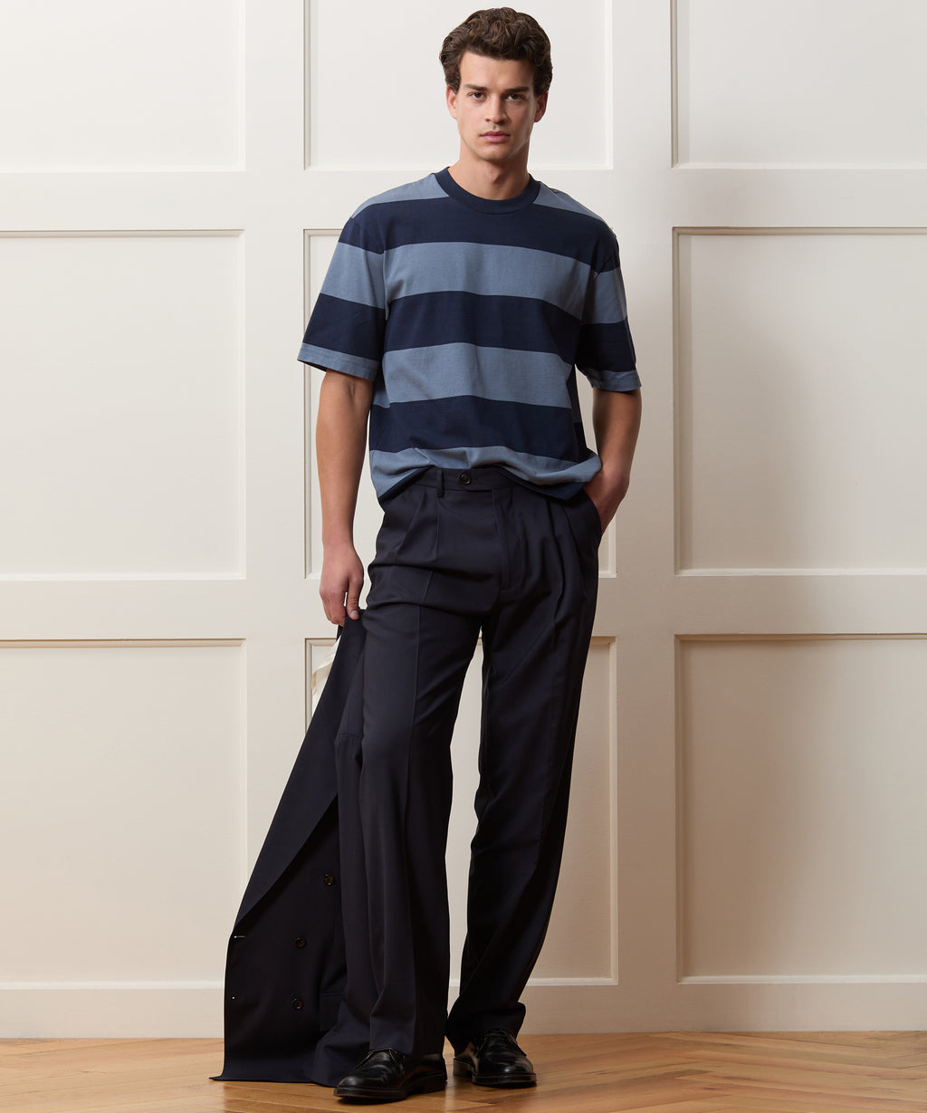 Model wearing the Todd Snyder Rugby Striped Cropped Jersey Tee in Blue.